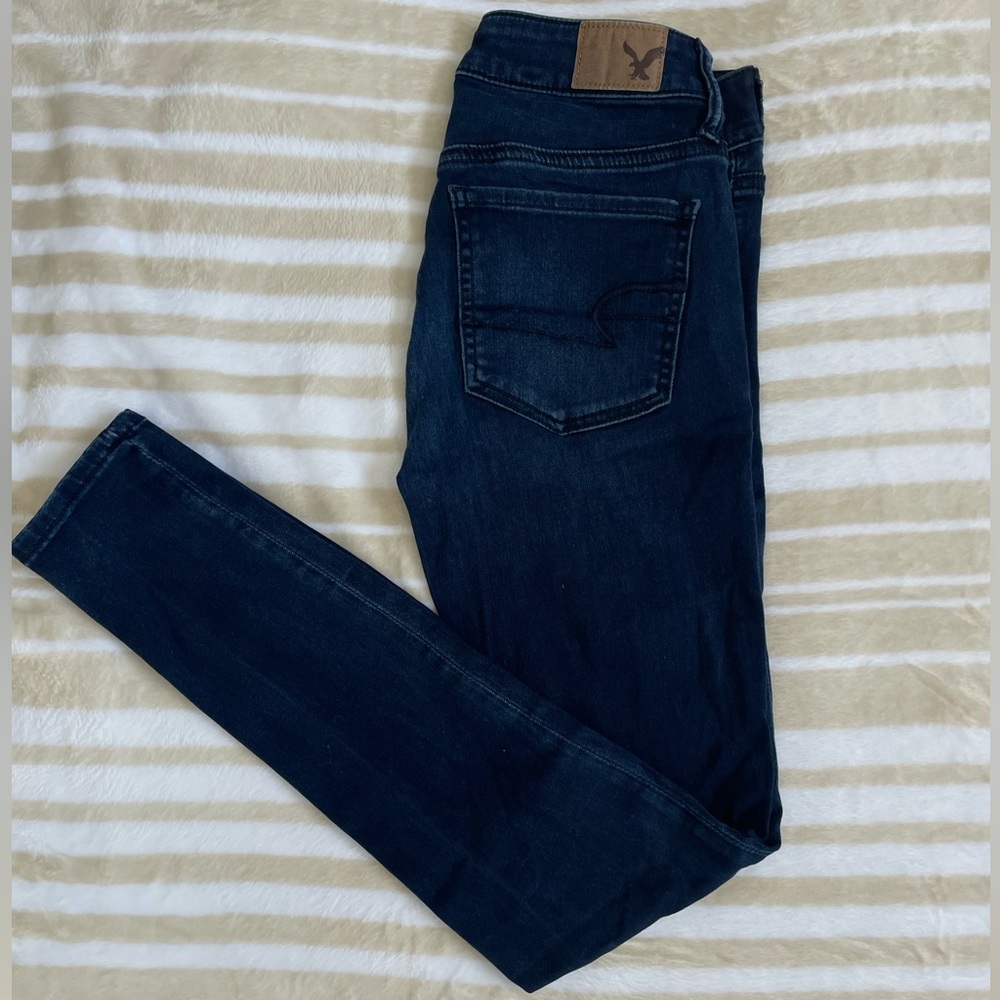 Woman’s 4 American Eagle Blue Jeans.